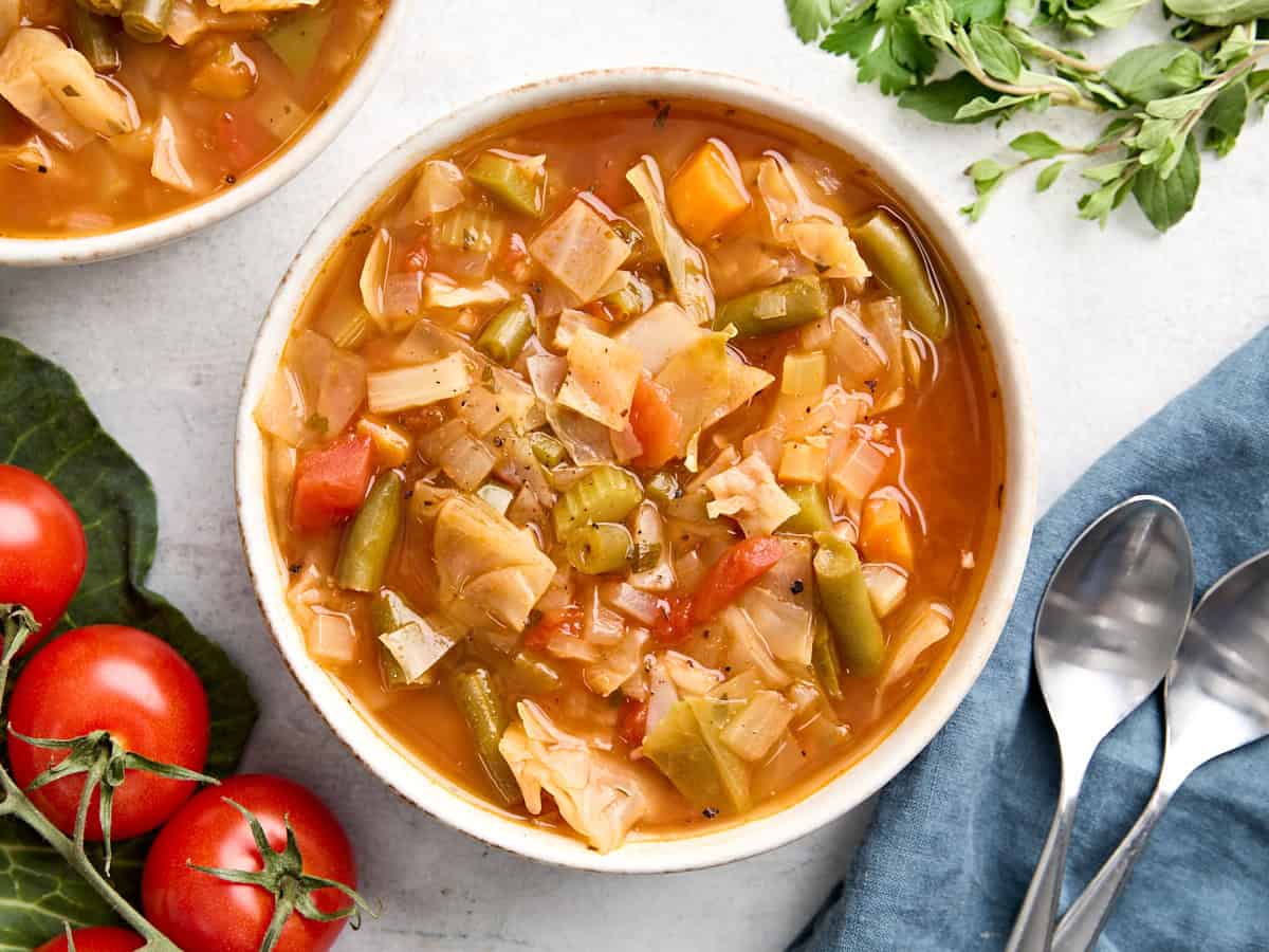 Overhead view of a bowl of cabbage soup.
